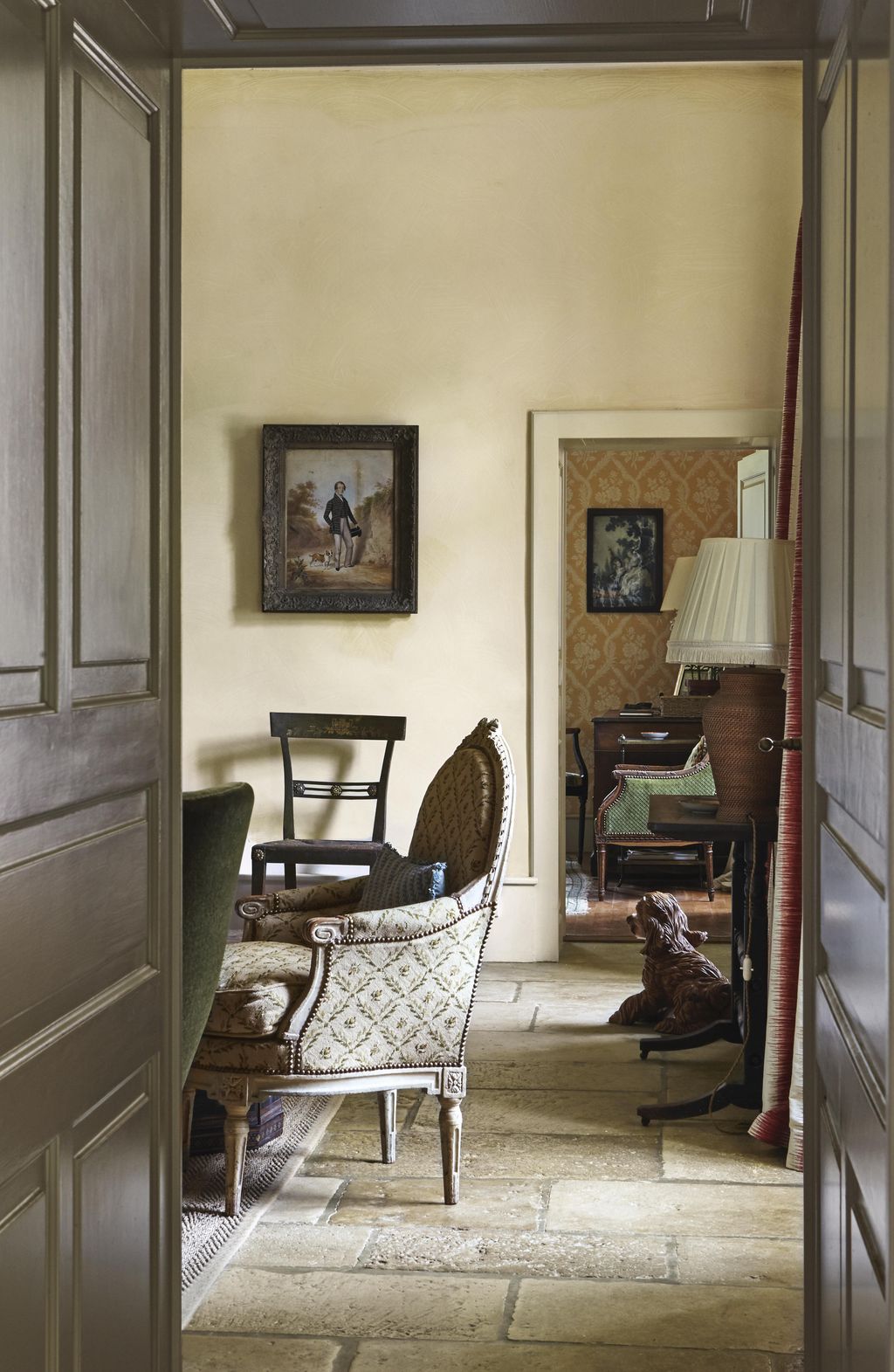 Image may contain Flooring Human Person Furniture Chair Wood Hardwood Floor Clothing Apparel and Home Decor