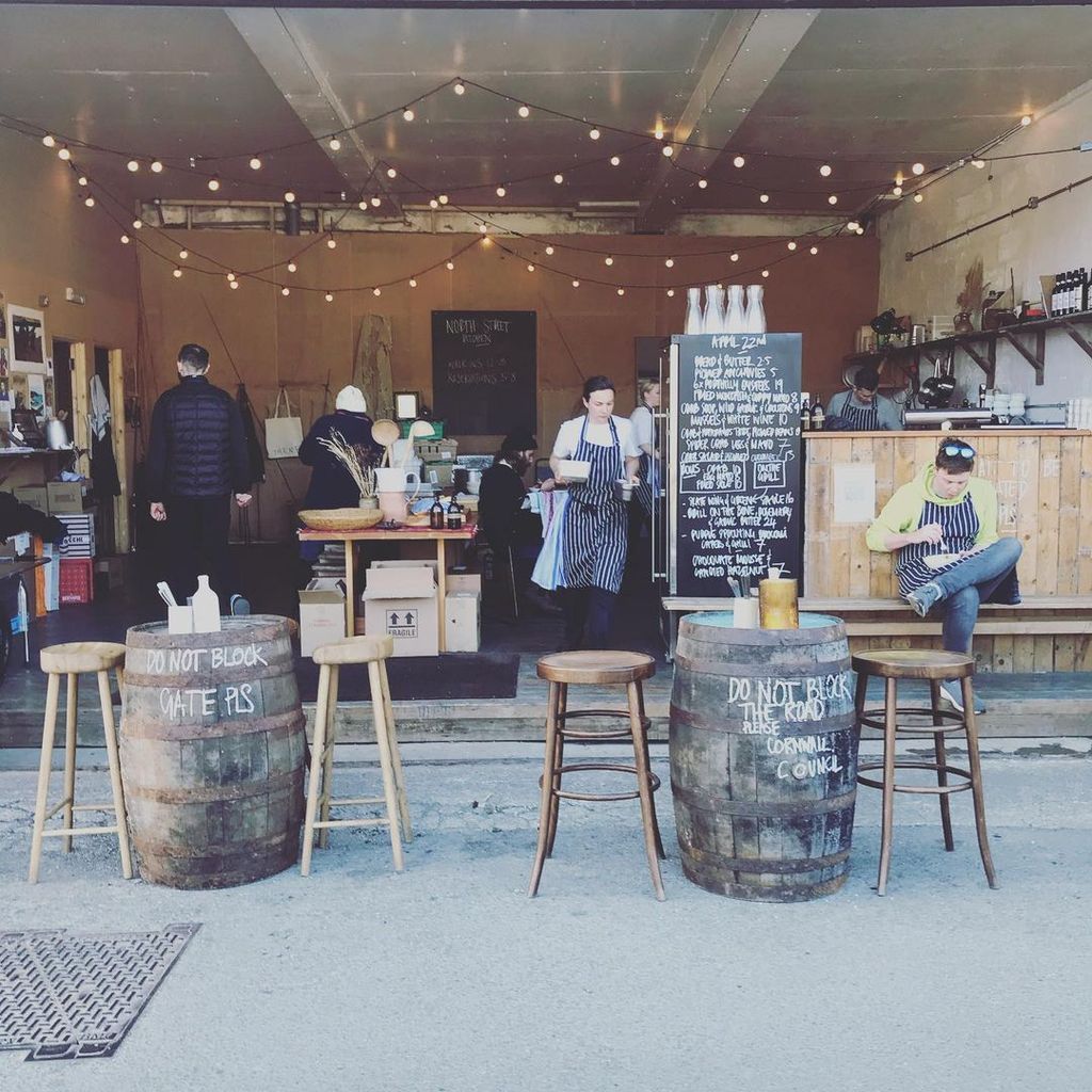 Image may contain Human Person Furniture Chair Restaurant Cafe and Shop