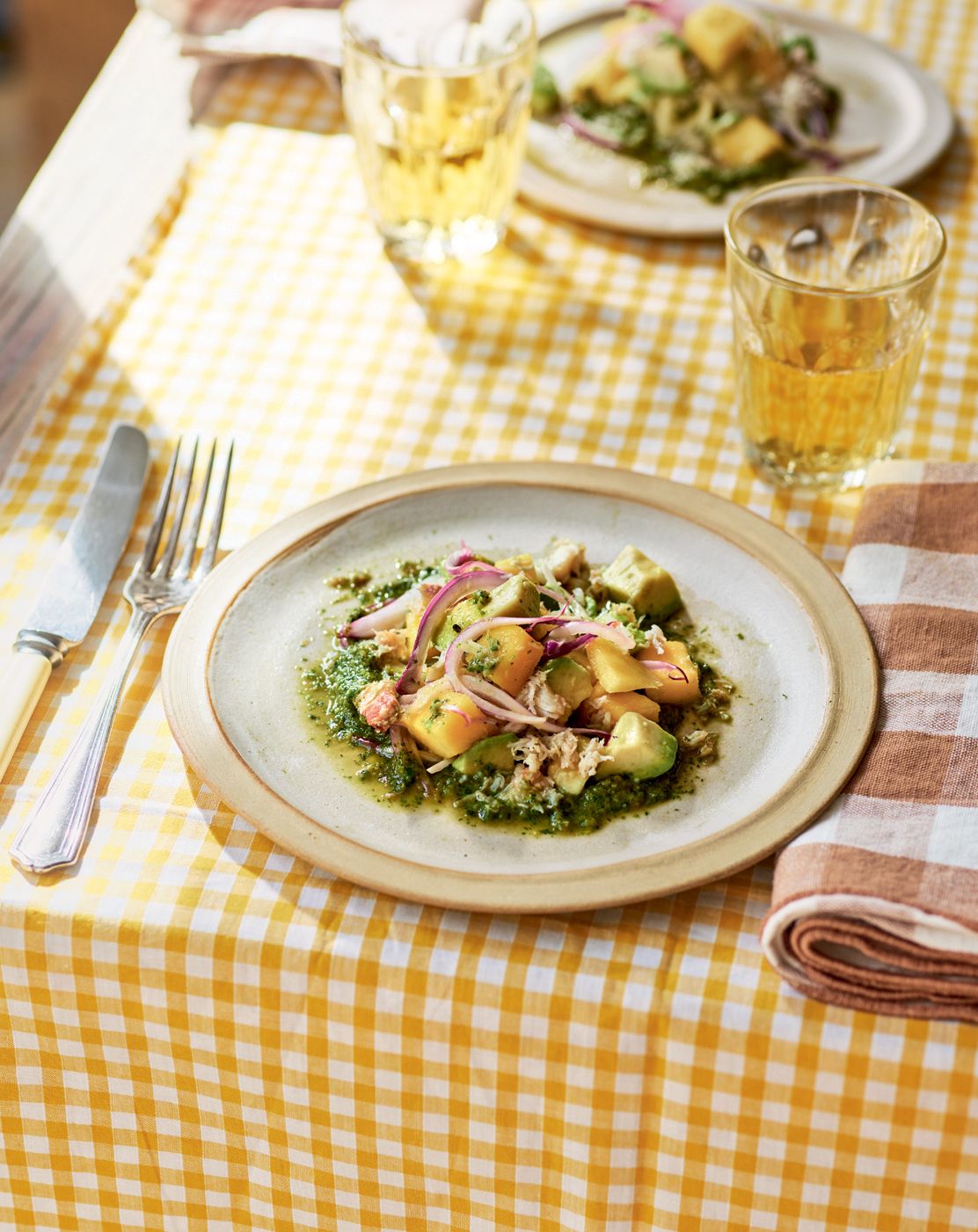 Image may contain Cutlery Fork Food Dish Meal Furniture Tabletop Tablecloth Plant and Home Decor