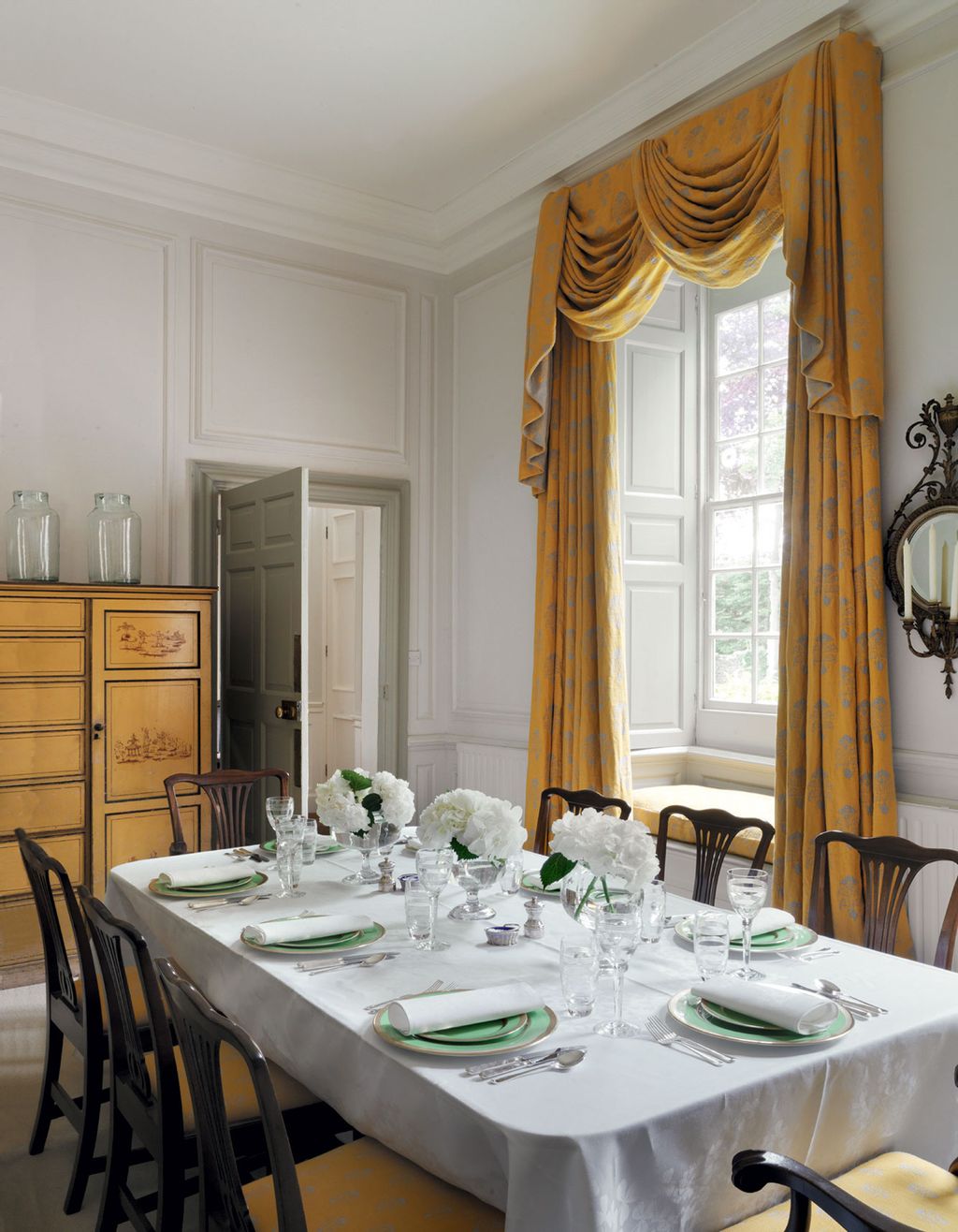 Image may contain Furniture Chair Table Dining Table Home Decor Indoors Room and Dining Room