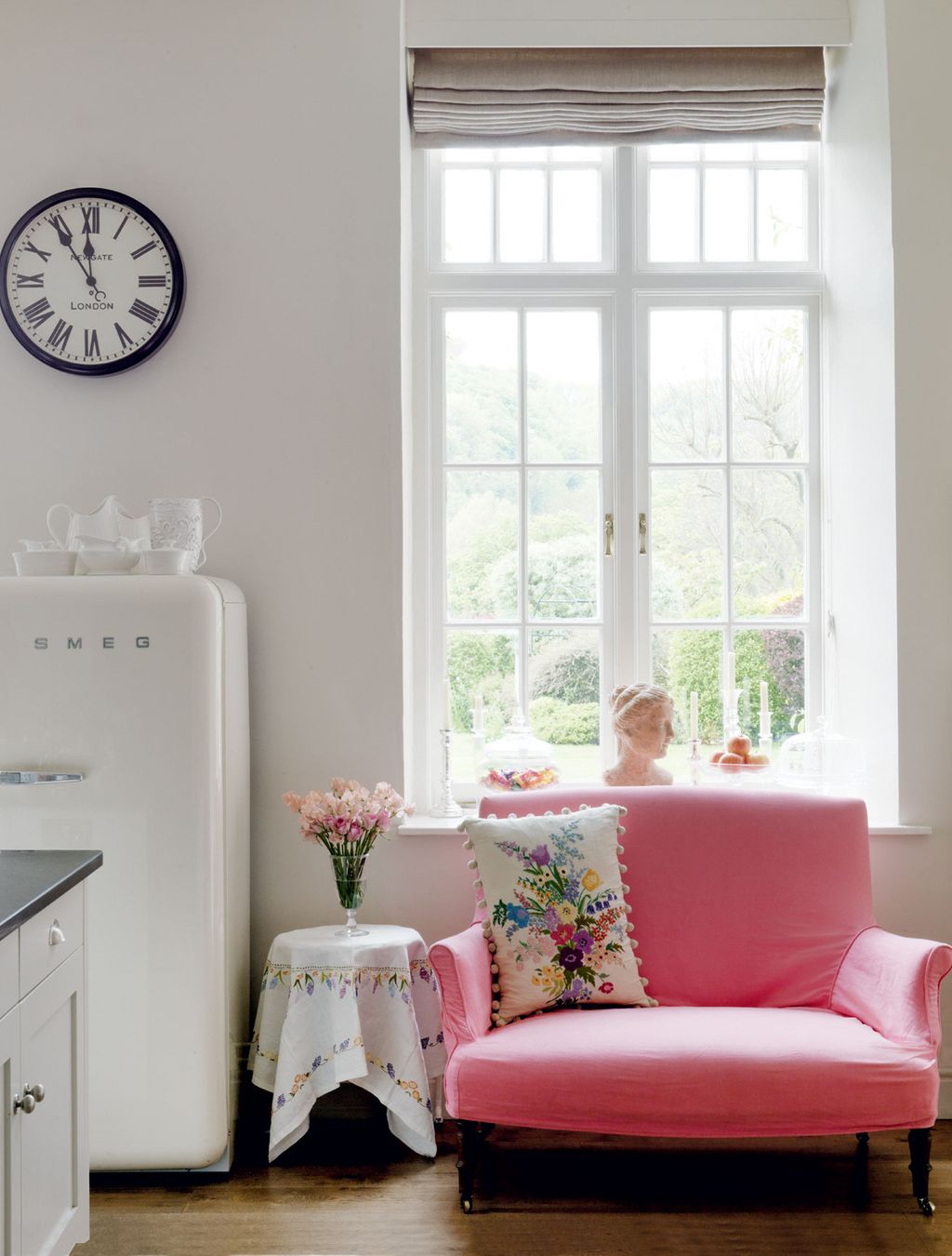 The retrostyle clock above the fridge is from John Lewis.