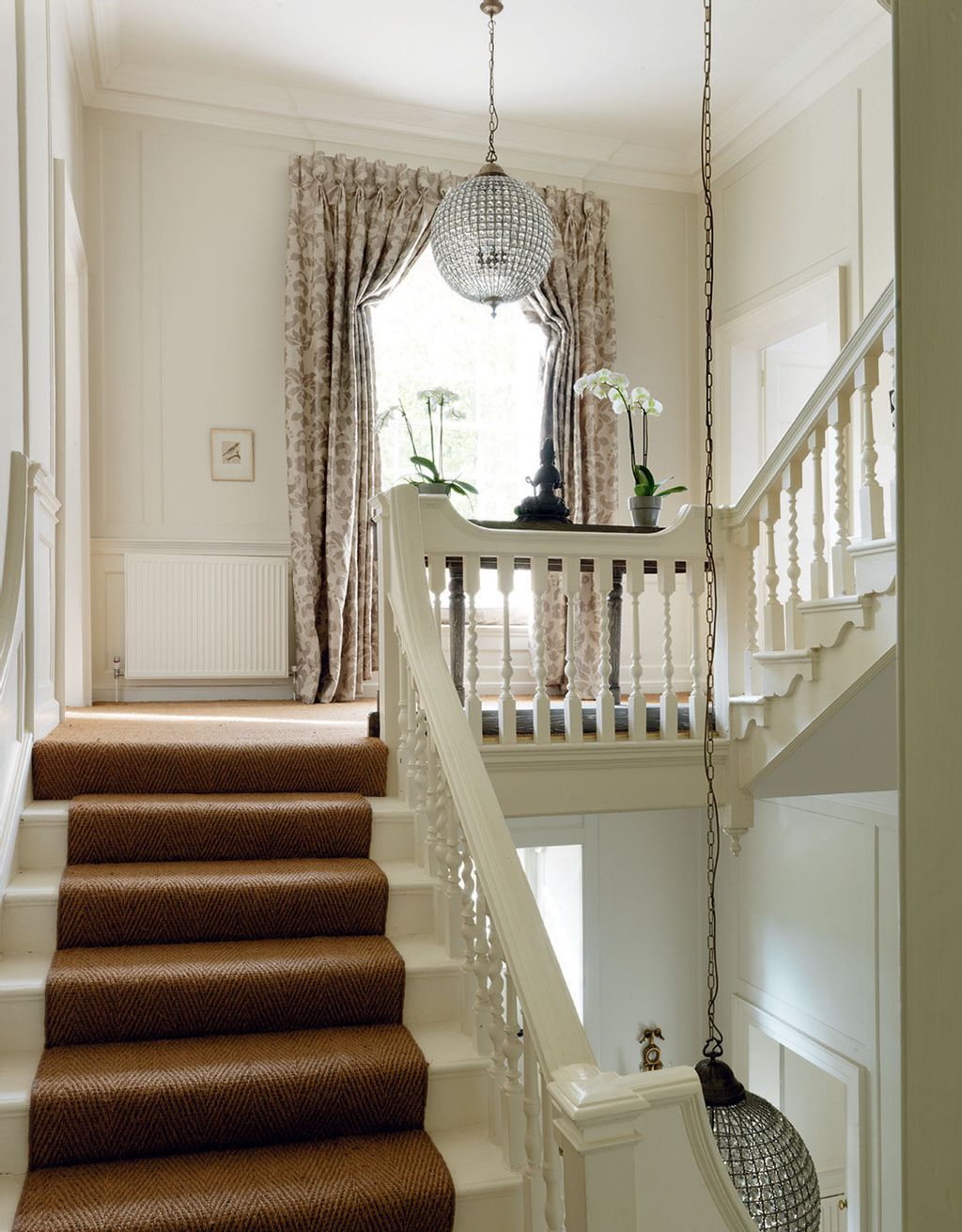 Image may contain Wood Staircase Interior Design Indoors Hardwood Banister and Handrail