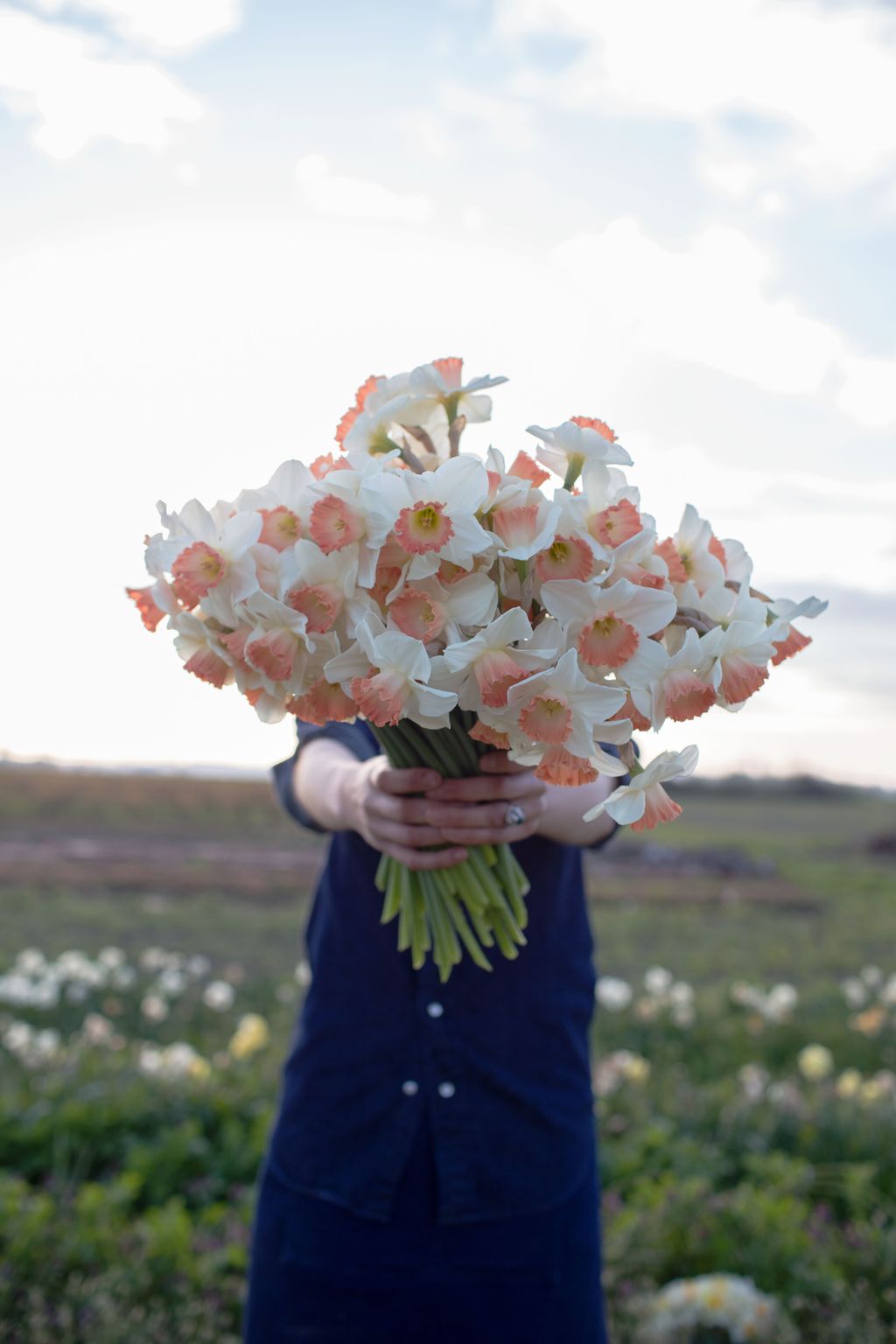 Image may contain Plant Human Person Flower Flower Bouquet Flower Arrangement and Blossom