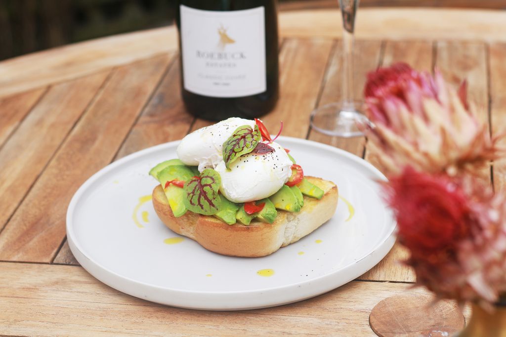 Image may contain Drink Alcohol Wine Beverage Burger Food Bottle and Bread