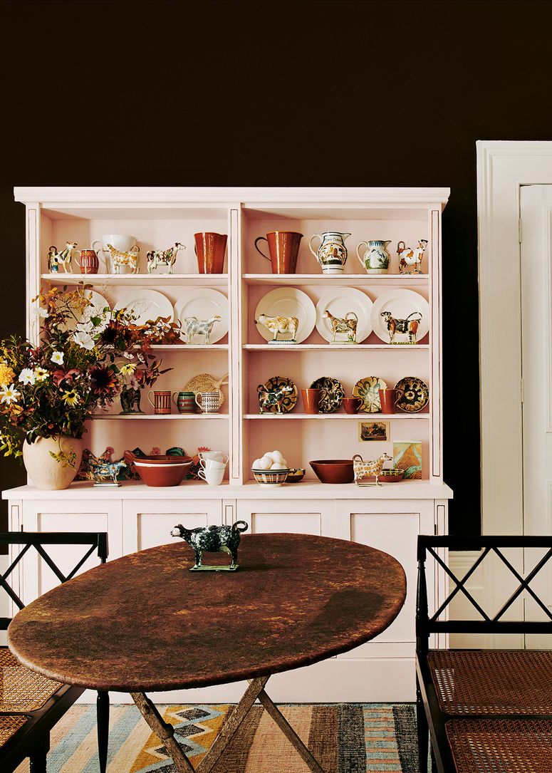 Image may contain: Furniture, Shelf, Table, Room, Indoors, Cupboard, Closet, and Interior Design