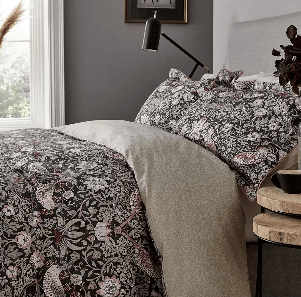 Image may contain Couch Furniture Bed Indoors Room Bedroom Cushion and Living Room