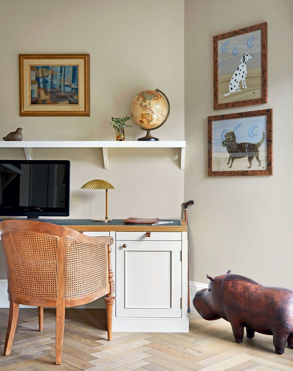 Image may contain Furniture Chair Electronics Monitor Display Screen Shelf Living Room Room Indoors and Table