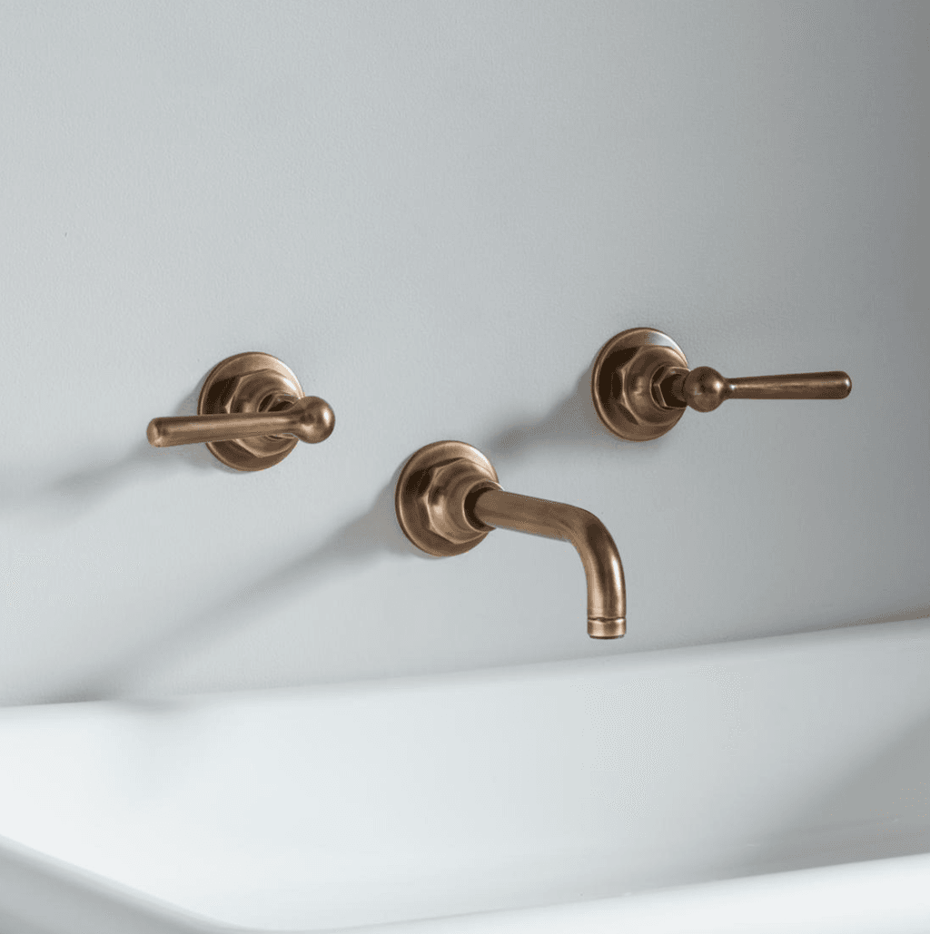 Image may contain Sink Faucet Indoors Bronze and Sink