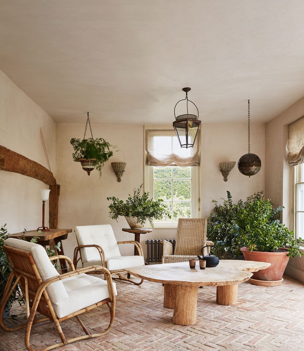 Image may contain Furniture Living Room Room Indoors Table Coffee Table Chair Couch and Wood