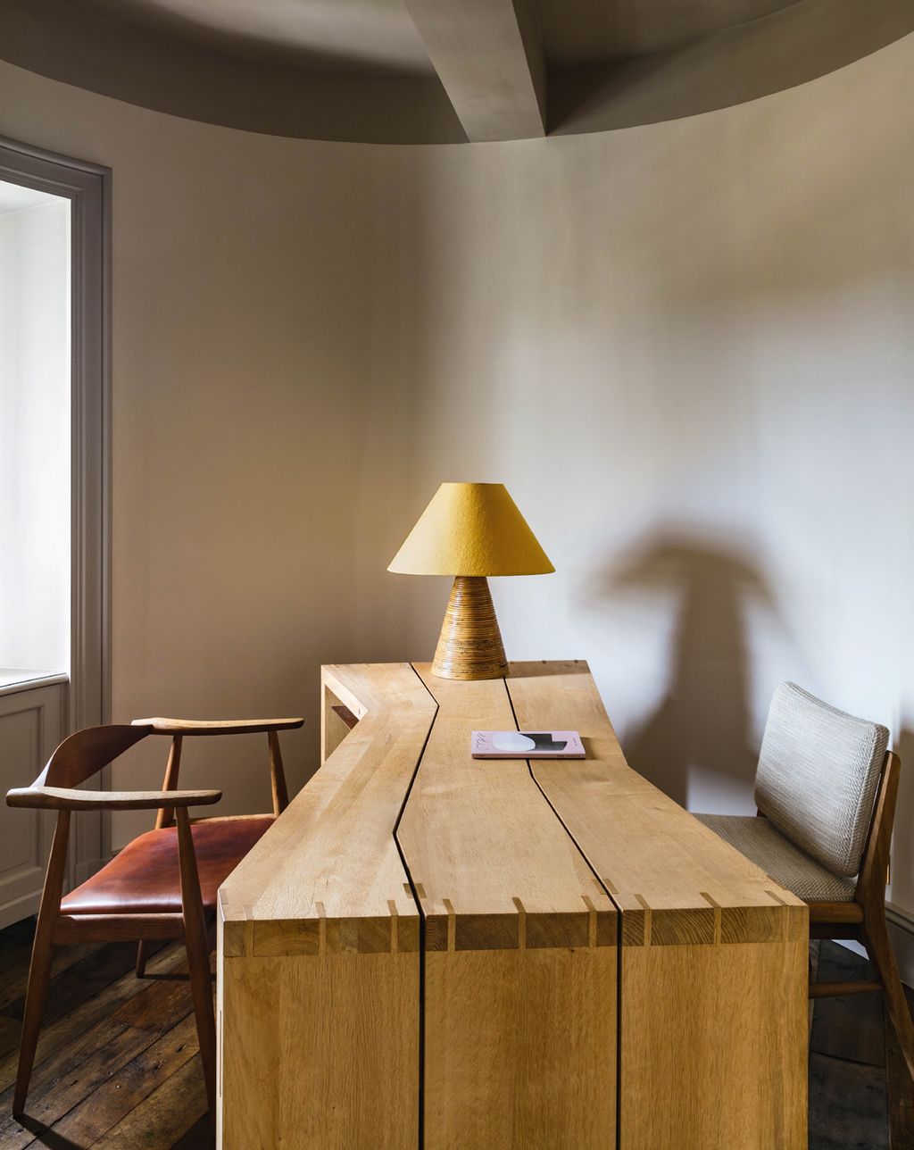 Image may contain Wood Plywood Lamp Table Lamp Hardwood Furniture Chair and Flooring