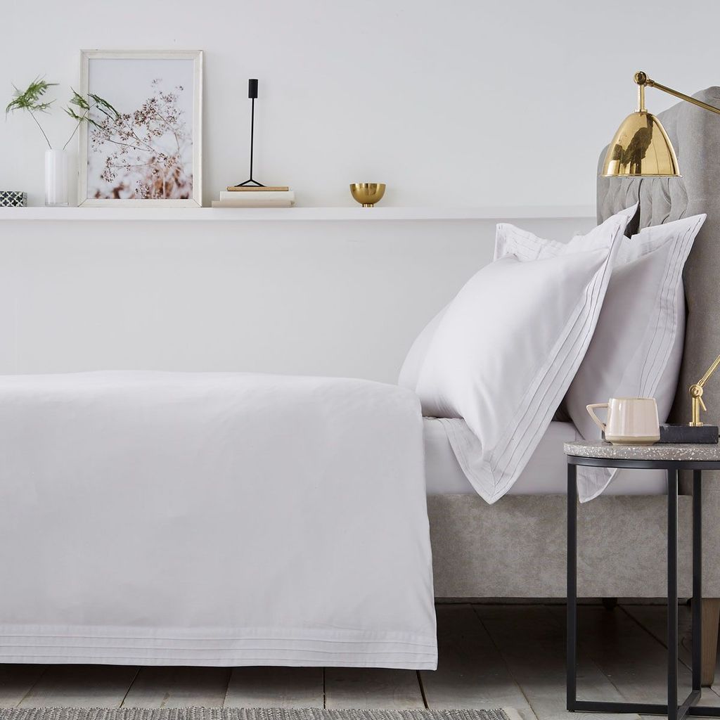 Image may contain Furniture Room Bedroom Indoors Interior Design Home Decor and Shelf