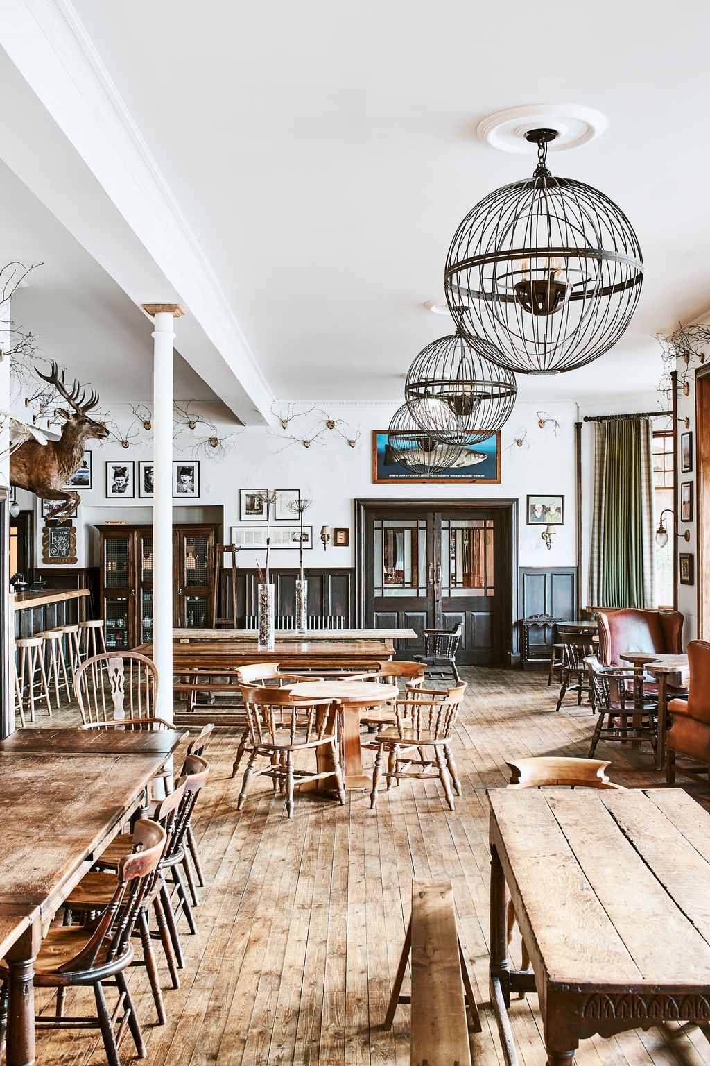 Image may contain Furniture Chair Restaurant Cafeteria Table Dining Table Wood Cafe Interior Design and Indoors