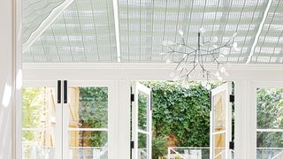 Image may contain Rug Indoors Room Furniture Chair Table and Dining Table