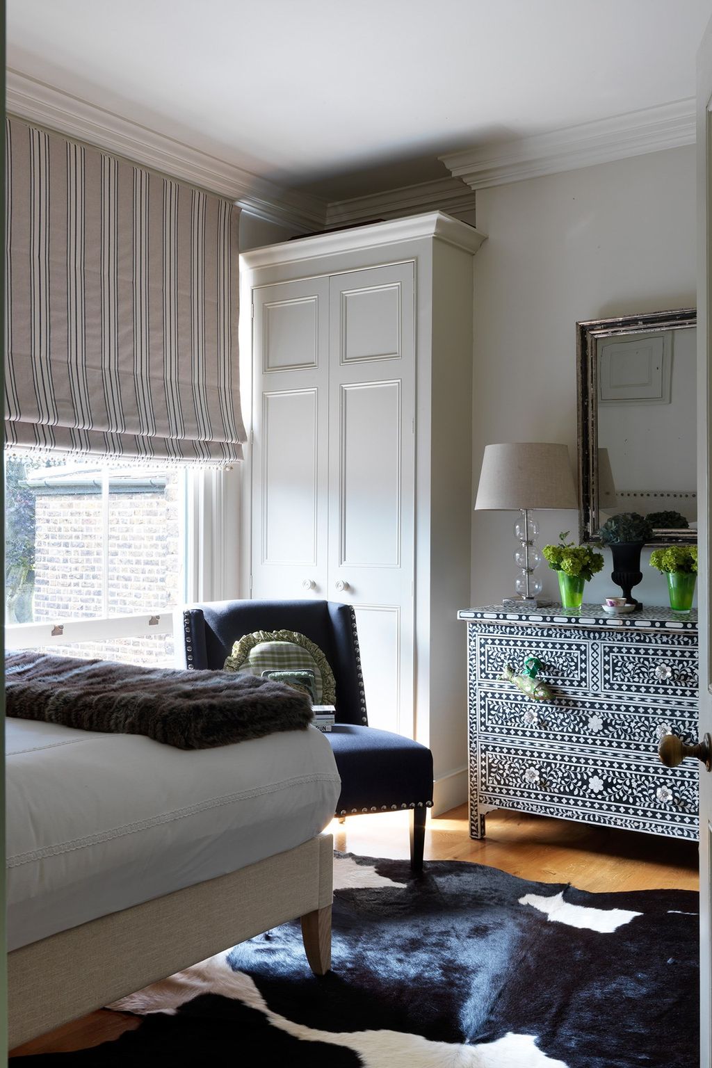 Image may contain Home Decor Furniture Interior Design Indoors Living Room Room Bed and Rug