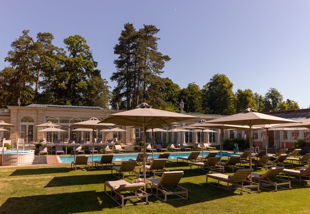 Image may contain Grass Plant Furniture Chair Patio Human Person and Lawn