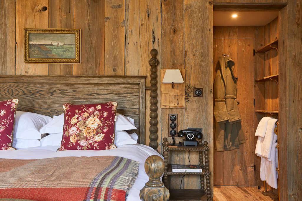 Image may contain Wood Home Decor Furniture Hardwood Bed Interior Design Indoors Plywood and Cushion