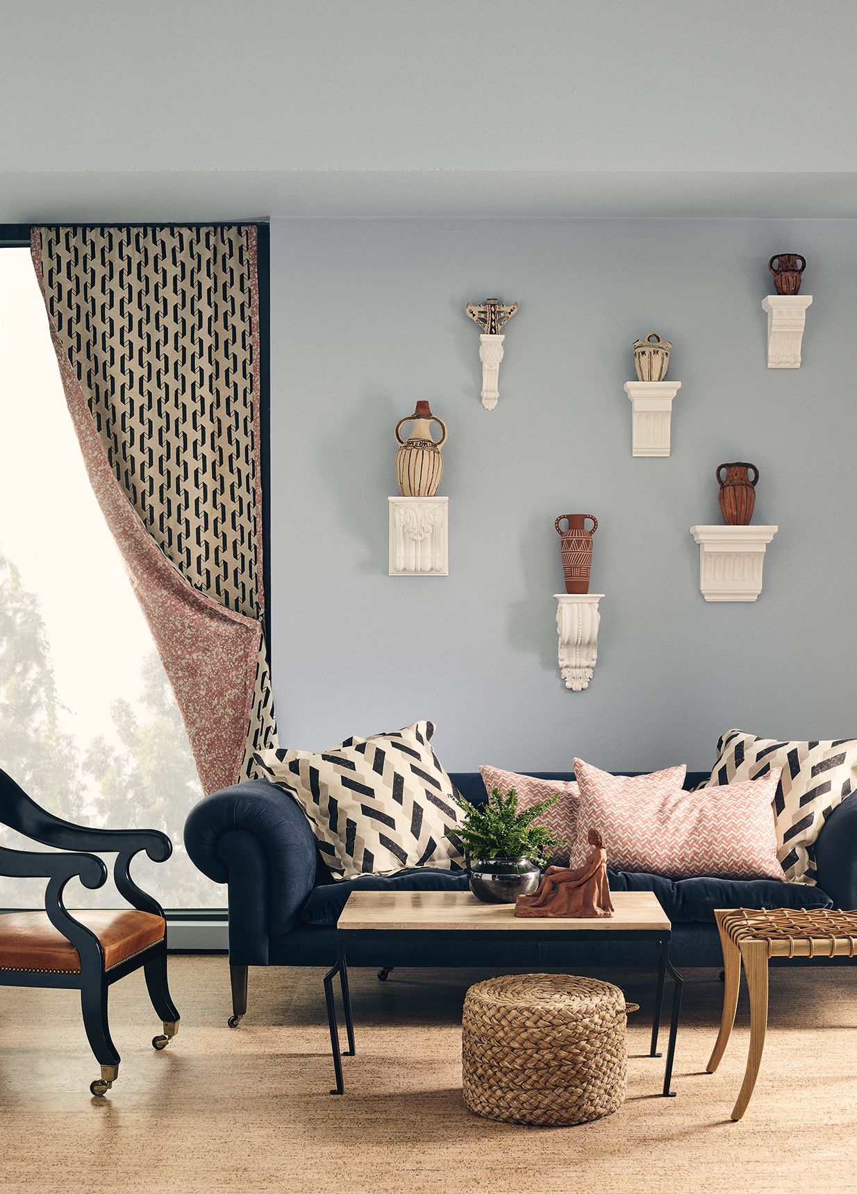 Image may contain Living Room Indoors Room Furniture Couch Cushion Table and Interior Design