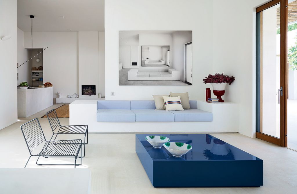 Image may contain Furniture Table Interior Design Indoors Living Room Room Coffee Table Couch Housing and Building