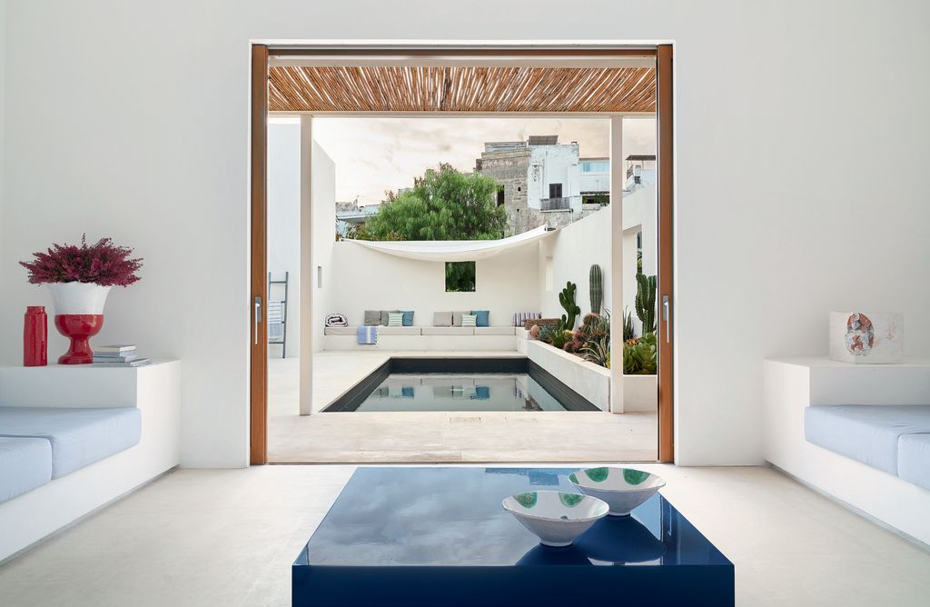 Image may contain Interior Design Indoors Pool Water Home Decor Furniture and Door