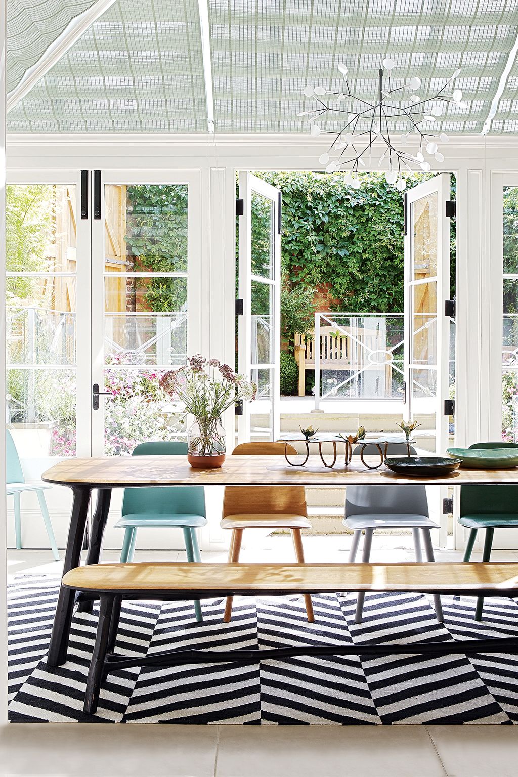 Image may contain Rug Furniture Chair and Table