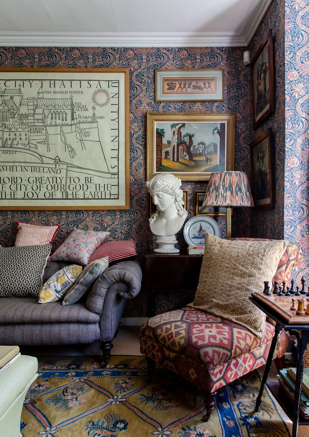 Image may contain Living Room Room Indoors Furniture Couch Praxiteles Interior Design Cushion Lamp and Table Lamp