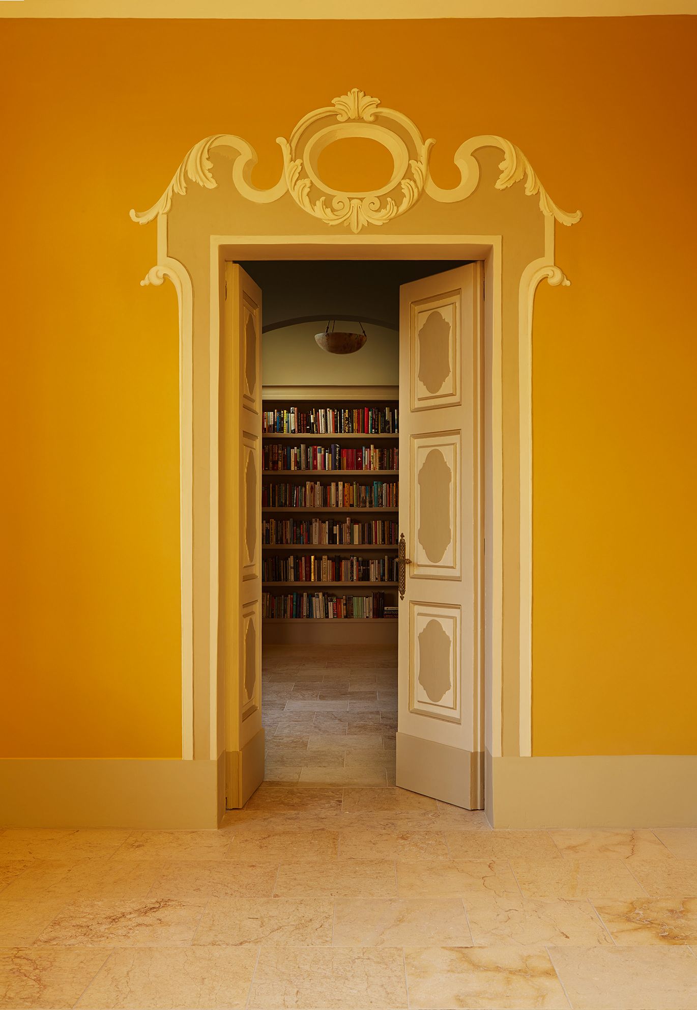 Image may contain Furniture Flooring Floor Bookcase Room Indoors Shelf Wood Home Decor and Interior Design