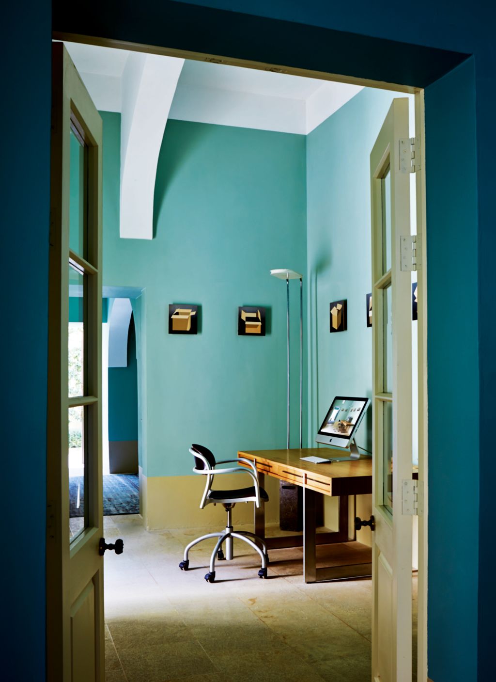 An Aksel Kjersgaard desk furnishes the study.