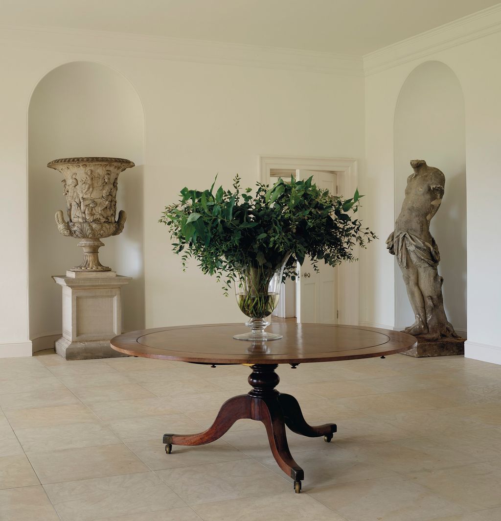 The garden room with an 18thcentury Flemish of Apollo on the right.