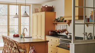 Image may contain Furniture Room Indoors Interior Design Kitchen Wood Kitchen Island and Shelf