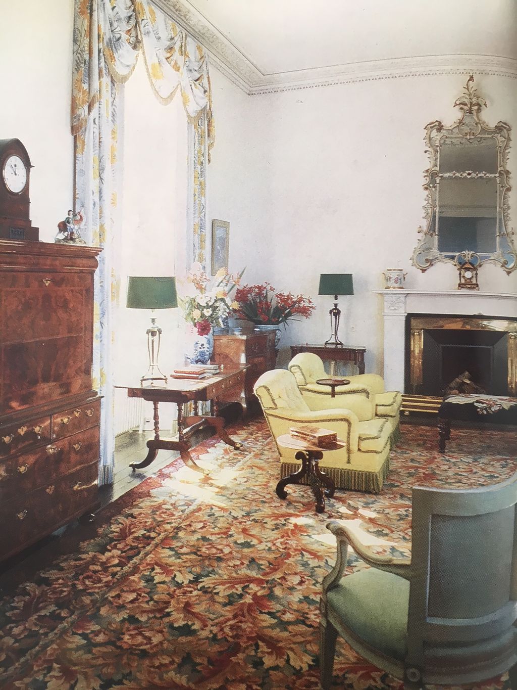 Image may contain Living Room Room Indoors Furniture Chair Fireplace Couch Interior Design Hearth and Rug