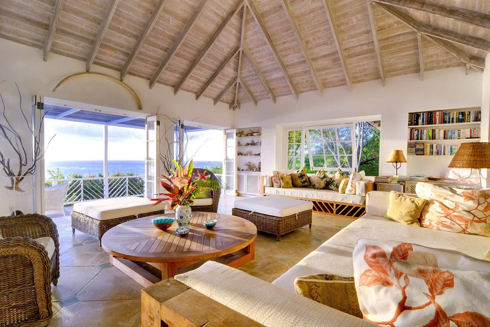 Image may contain Furniture Indoors Interior Design Living Room Room Table Flooring Housing and Building