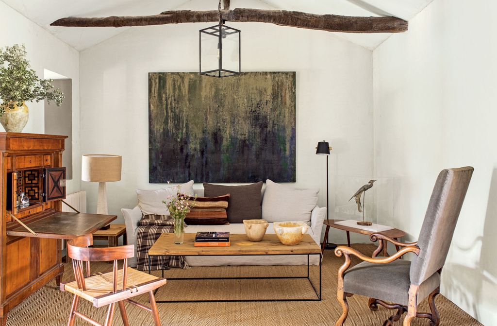 Image may contain Furniture Chair Living Room Room Indoors Table Coffee Table Interior Design Couch and Tabletop