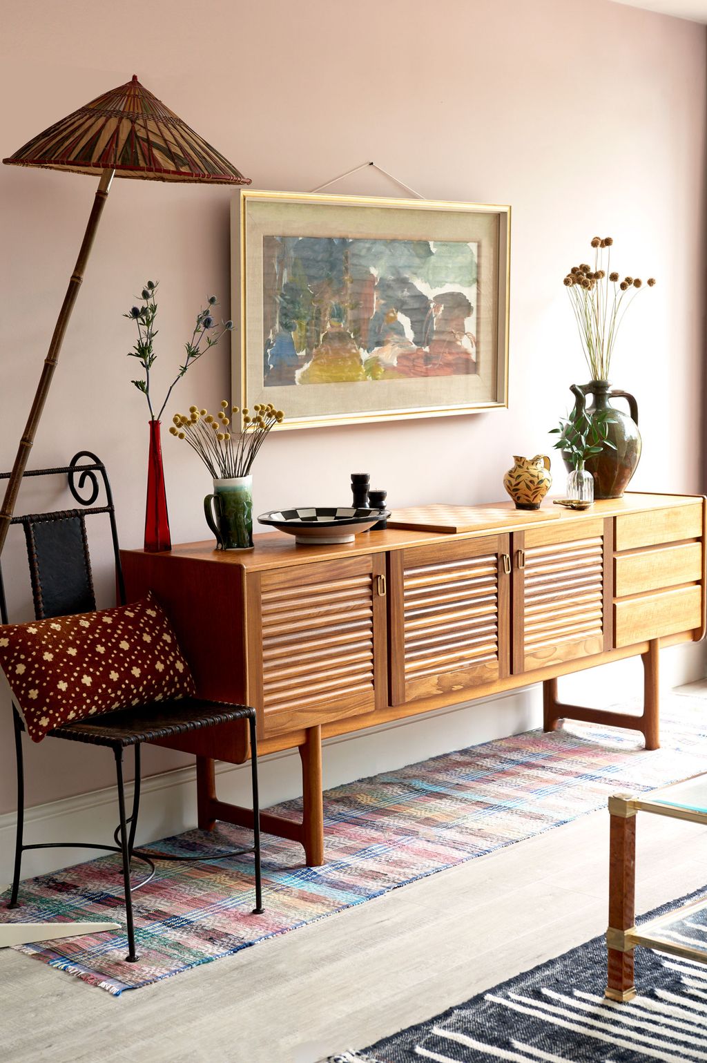 Image may contain Furniture Sideboard Chair Rug Interior Design and Indoors