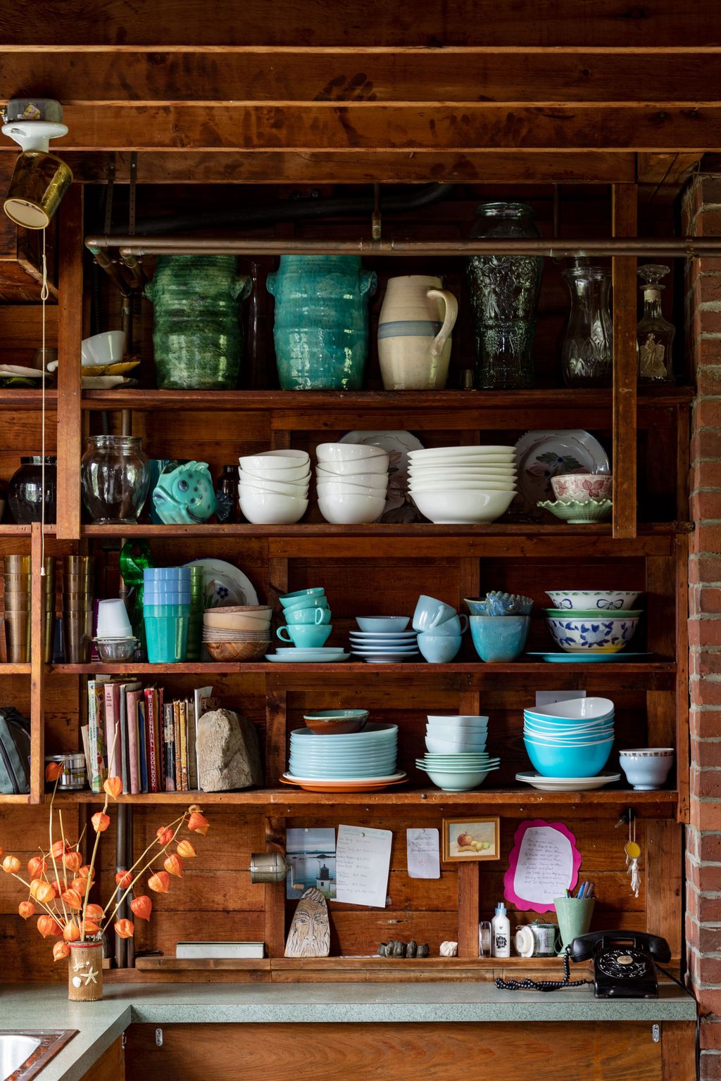 Image may contain Furniture Shelf Bowl Cabinet China Cabinet Cupboard and Closet