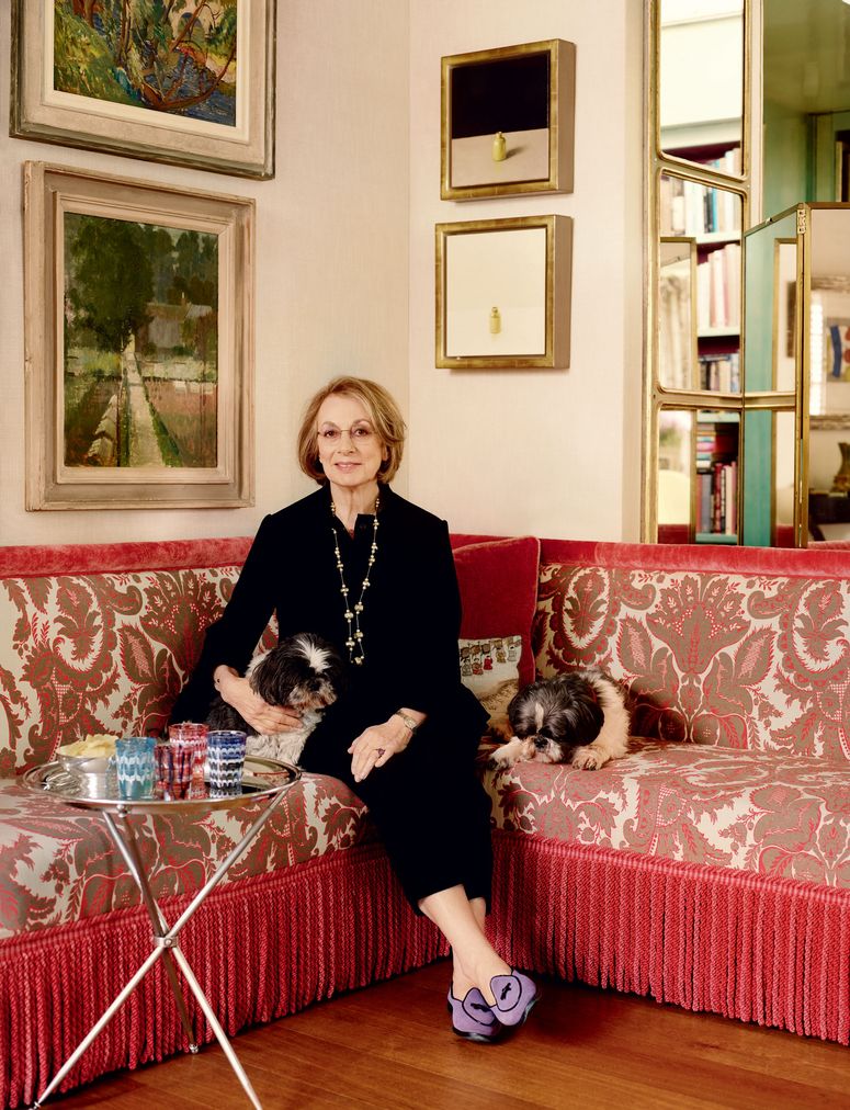 Image may contain: Furniture, Couch, Human, Person, Living Room, Room, Indoors, Home Decor, Shelf, Clothing, and Apparel