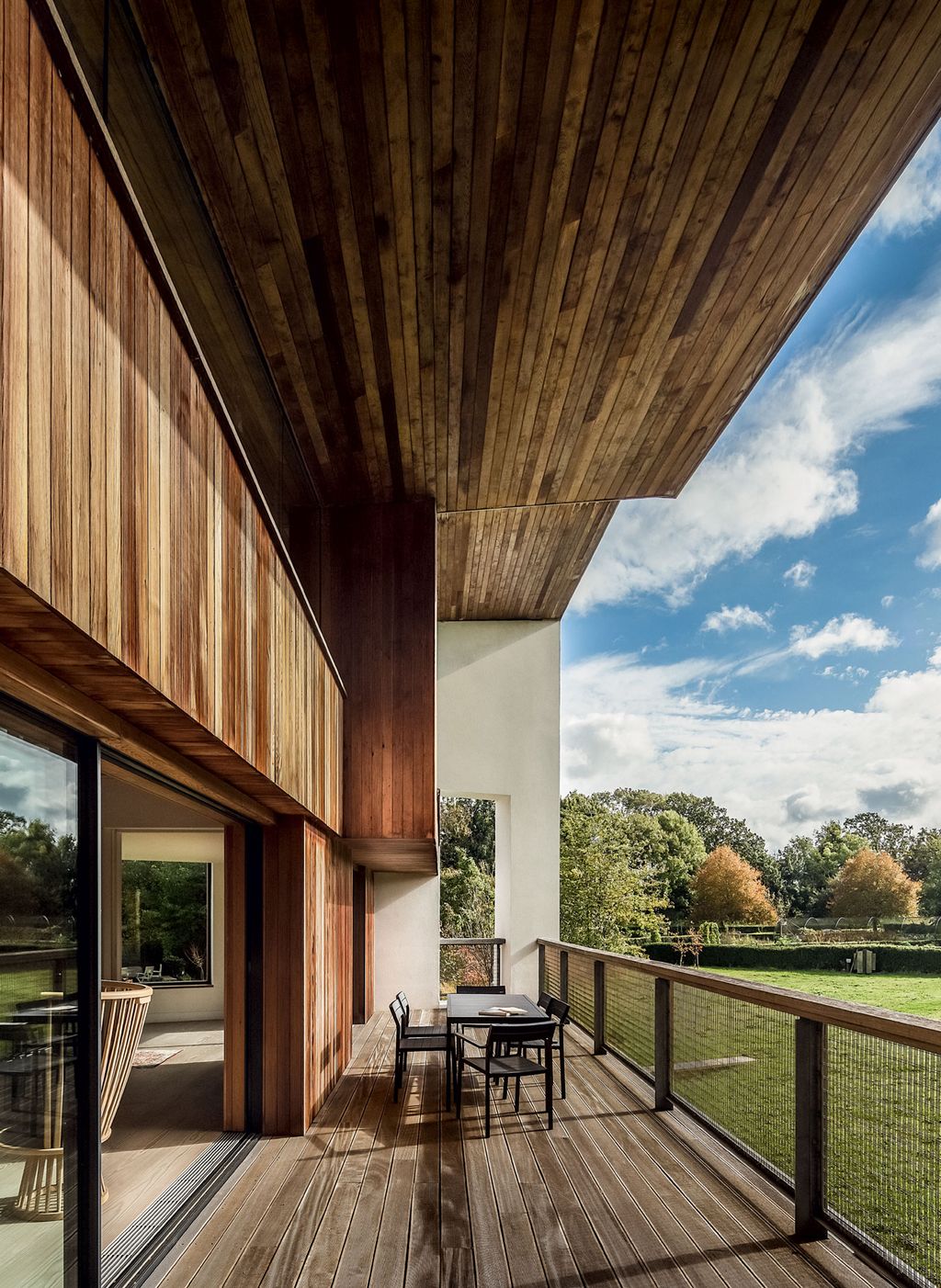 Image may contain Wood Balcony Railing and Hardwood