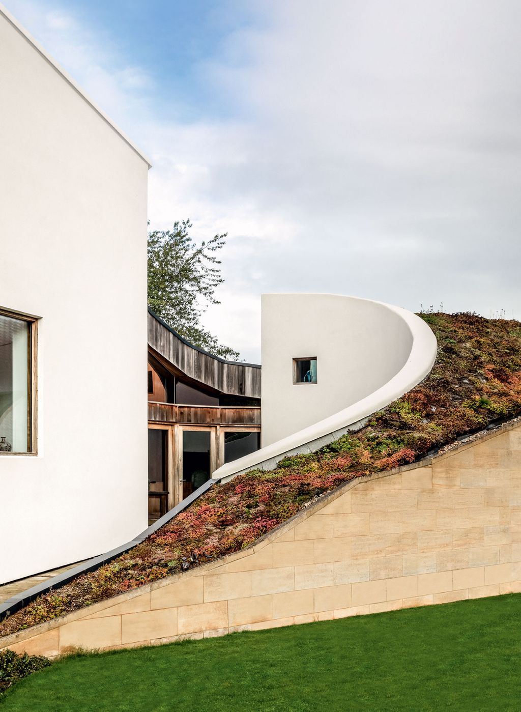 Image may contain Banister Handrail Slope Plant and Grass