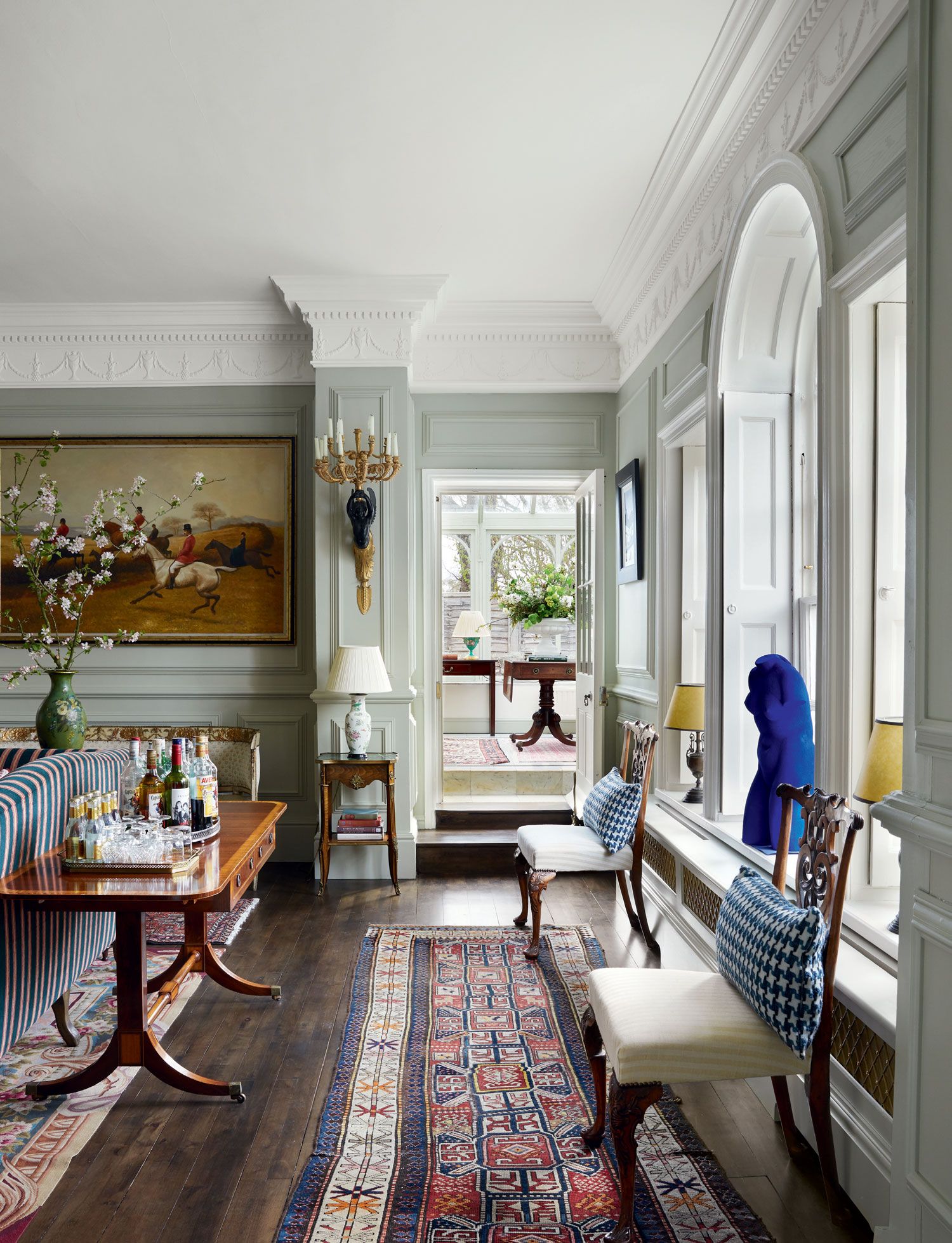 Created by amalgamating two small rooms the library is an elegant space with new Georgianstyle panelling to reflect the...