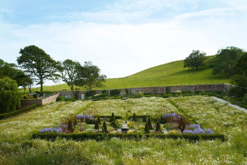 Image may contain Grassland Field Outdoors Nature Countryside Rural Farm and Meadow