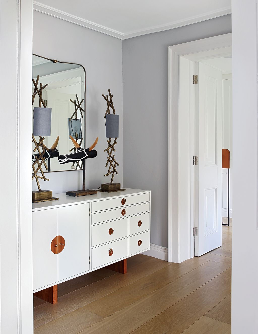 Image may contain Furniture Sideboard Floor Flooring Cabinet Wood and Dresser