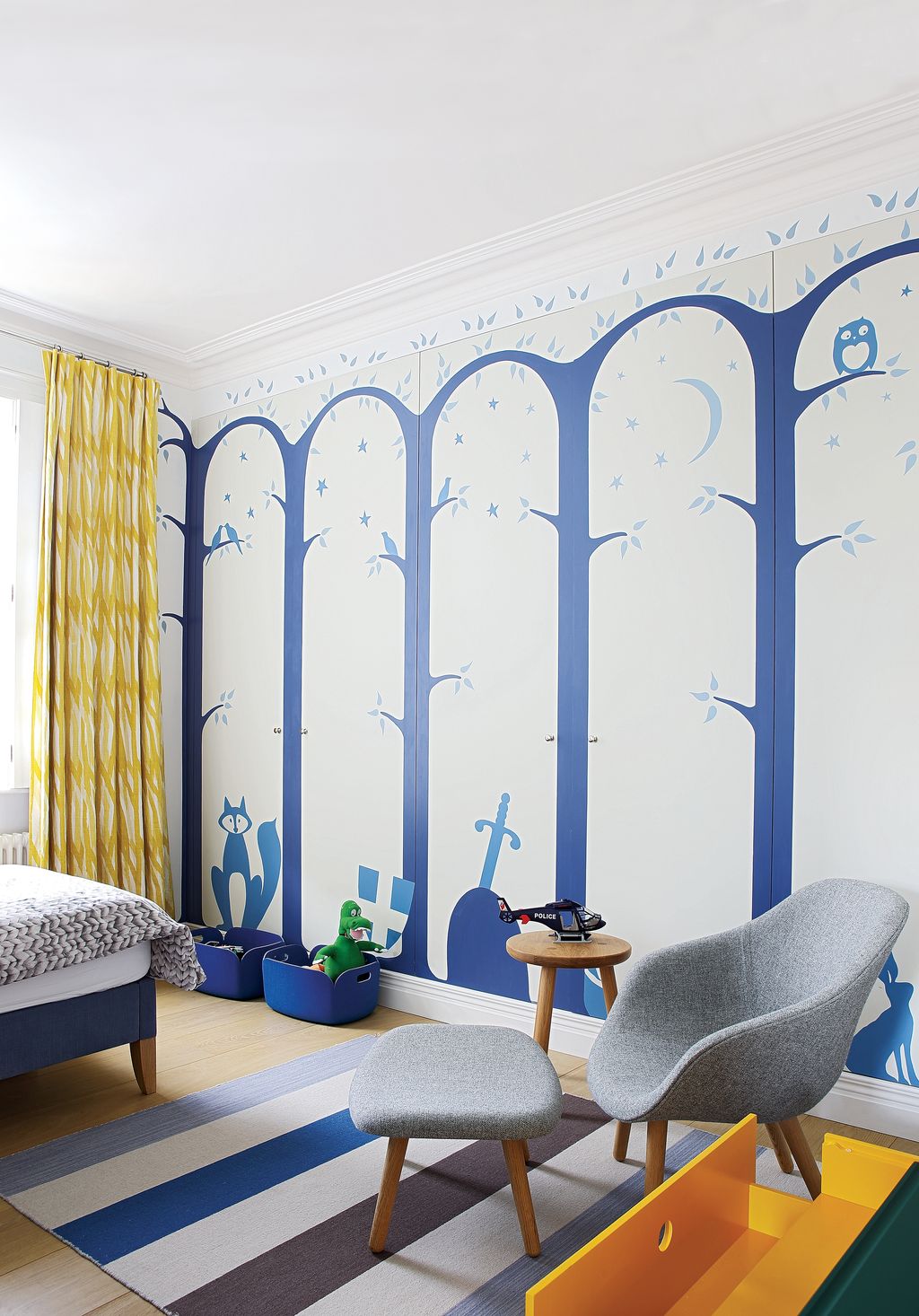 Image may contain Furniture Interior Design Indoors Room Bedroom Chair Living Room Rug Cushion and Pillow