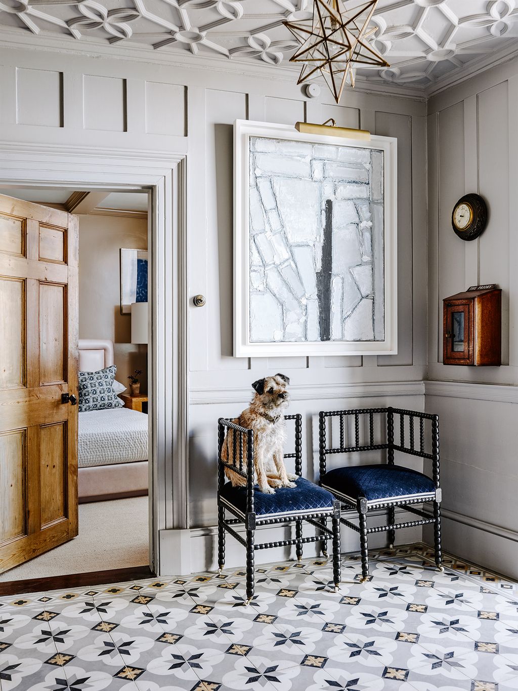 The starshape lantern was found at Stiffkey Period Lighting in Norfolk. Oscar the border terrier sits on one of two...