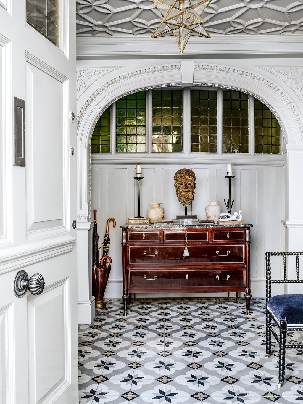 Image may contain Furniture Flooring Floor Rug Cabinet Wood and Hardwood