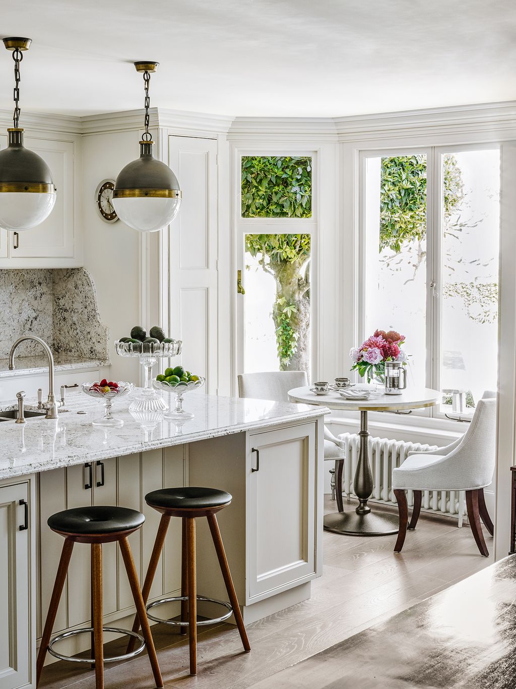 Image may contain Furniture Indoors Room Chair Interior Design Kitchen Island and Kitchen