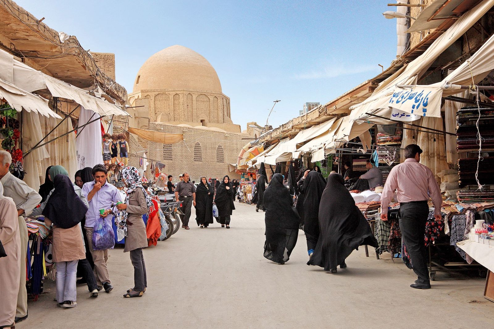 Image may contain Human Person Pedestrian Architecture Dome Building Clothing Apparel City Town and Urban