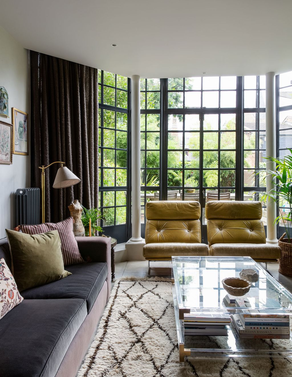 Image may contain Furniture Living Room Room Indoors Couch Table Coffee Table and Rug