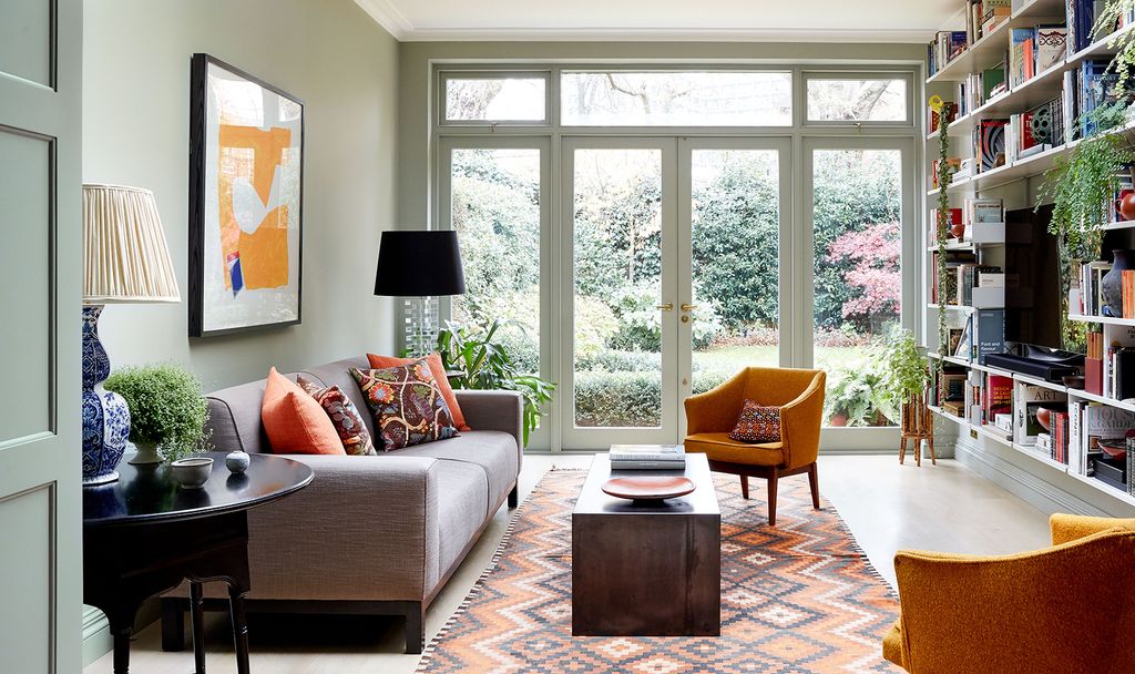 Image may contain Furniture Table Coffee Table Living Room Indoors Room and Chair