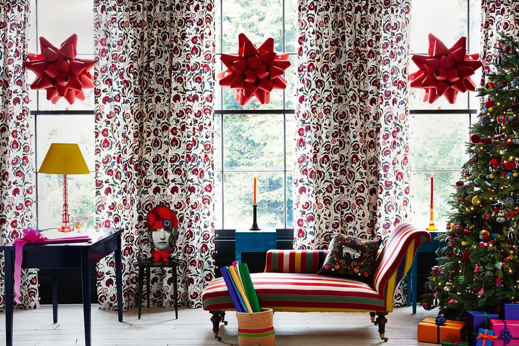 Go oversize on decorations for impact. One of these paper rosettes would hold its own in a small room. Bespoke giant...