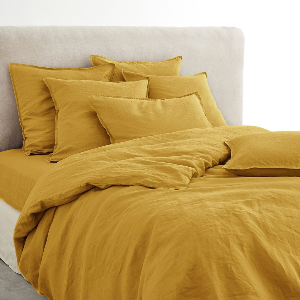 Image may contain Furniture Bed Cushion Pillow Home Decor Blanket and Linen