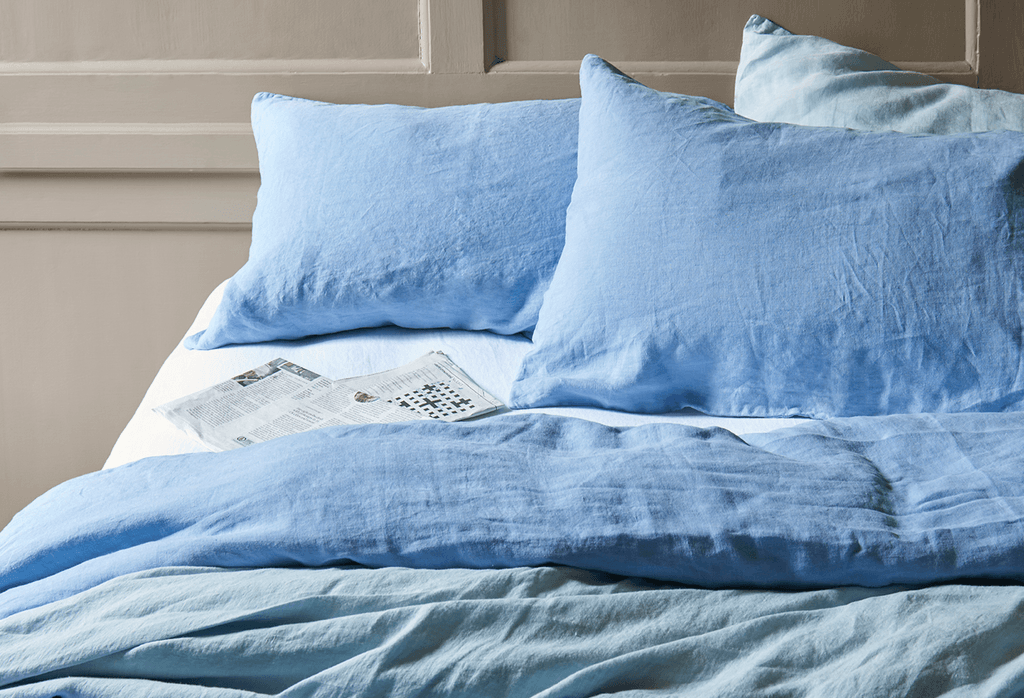 Image may contain Cushion Pillow Home Decor Linen Furniture Bed and Couch